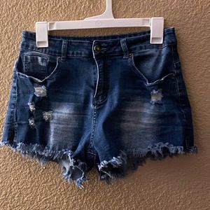 Distressed jean shorts. Size Large